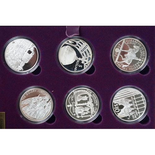 155 - A Royal Mint Queen Elizabeth II 2002 Golden Jubilee coin set, comprising of twenty four silver proof... 