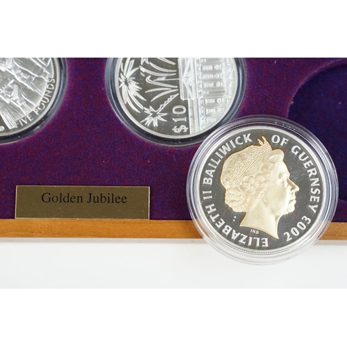 155 - A Royal Mint Queen Elizabeth II 2002 Golden Jubilee coin set, comprising of twenty four silver proof... 