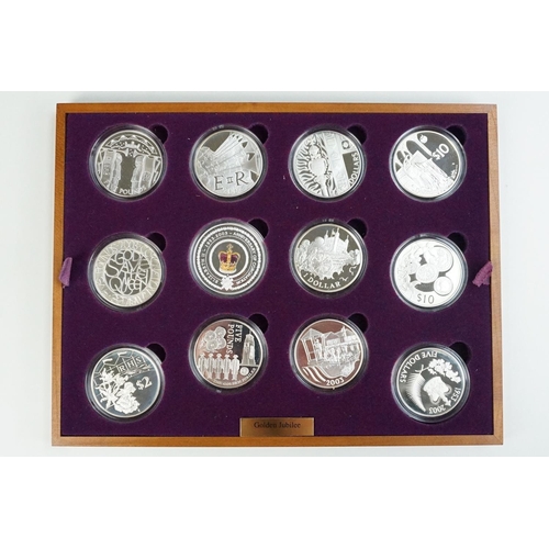 155 - A Royal Mint Queen Elizabeth II 2002 Golden Jubilee coin set, comprising of twenty four silver proof... 