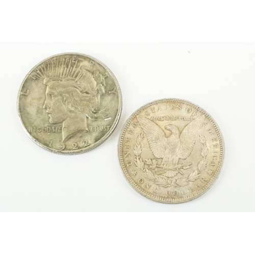 18 - Two United States of America silver dollar coins to include 1897 and 1922 examples.