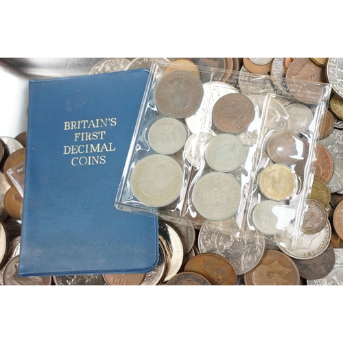 180 - A collection of British and World coins to include British pre decimal silver and commemorative crow... 