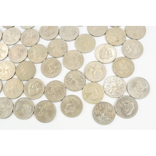 19 - A large collection of British commemorative crown coins.