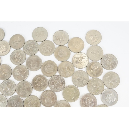 19 - A large collection of British commemorative crown coins.