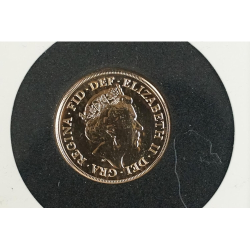 197 - A United Kingdom Queen Elizabeth II 2019 gold full sovereign, slab mounted within fitted display cas... 