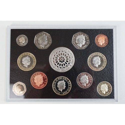 201 - A collection of three Royal Mint United Kingdom Queen Elizabeth II annual proof coin sets to include... 