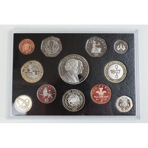 201 - A collection of three Royal Mint United Kingdom Queen Elizabeth II annual proof coin sets to include... 