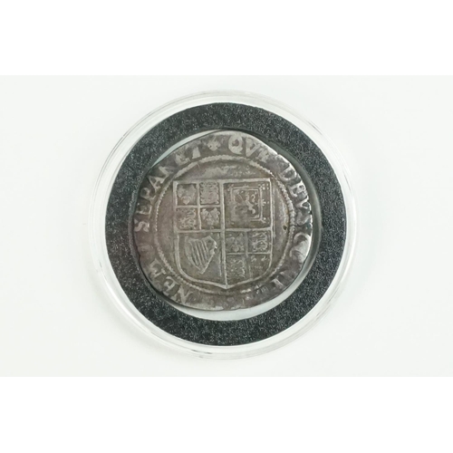 205 - A British hammered silver King James 1st (1604-1625) shilling coin, encapsulated within fitted displ... 