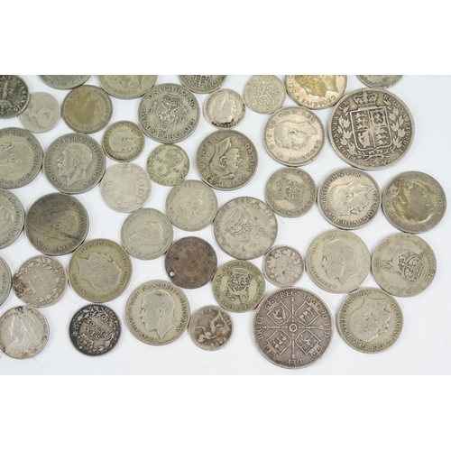 21 - A large collection of British pre decimal pre 1947 and pre 1920 silver coins to include half crowns,... 