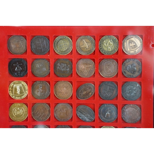 33 - A large collection of Masonic lodge medallions contained within two Lindner collectors cases.