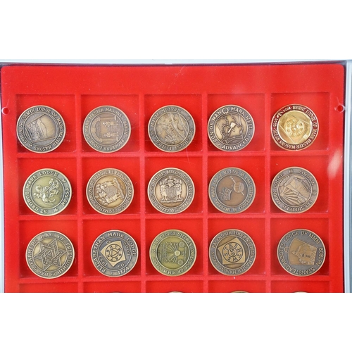 38 - A large collection of Masonic lodge medallions contained within two Lindner collectors cases.