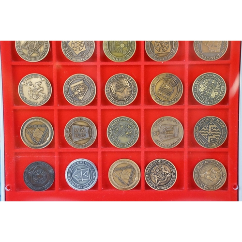 38 - A large collection of Masonic lodge medallions contained within two Lindner collectors cases.