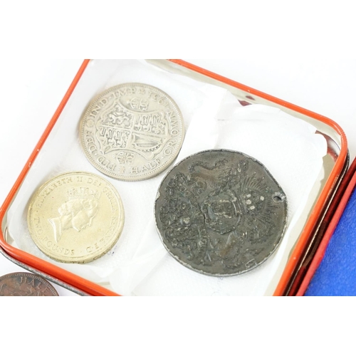 44 - A small collection of coins to include pre decimal silver and uncirculated examples.