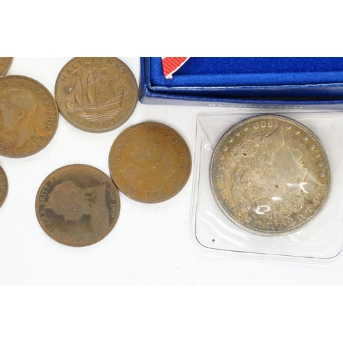 44 - A small collection of coins to include pre decimal silver and uncirculated examples.