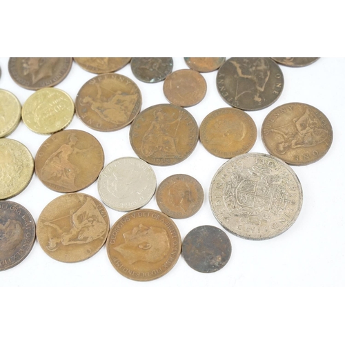 45 - A small collection of mainly British pre decimal coins to include some silver examples.