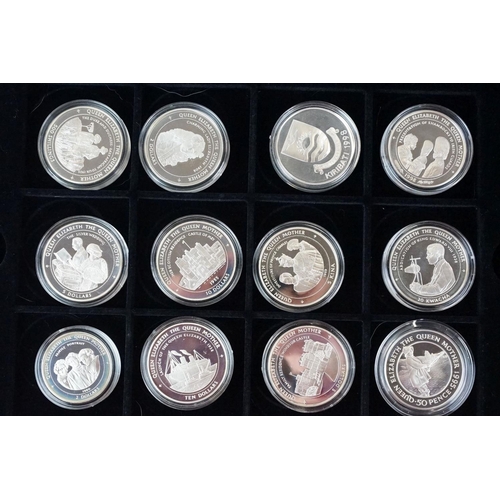 49 - A large collection of over fifty silver proof coins to include Crowns, $10, £5 and £1 examples, all ... 