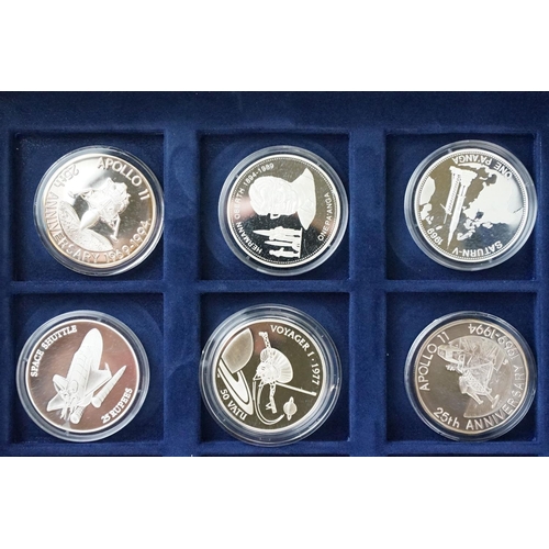 62 - The Space Exploration commemorative silver proof coin set, comprising of 24 silver proof coins encap... 