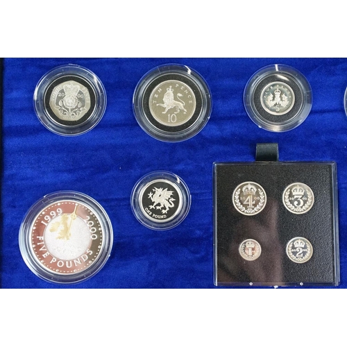 64 - A Royal Mint UK Millenium Silver Collection coin set, comprising nine coins and four Maundy Coins, i... 