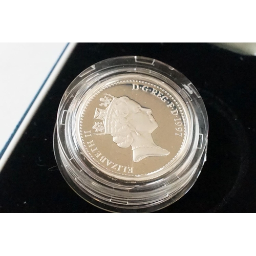 69 - Three Royal Mint United Kingdom silver proof £1 coins to include 1994, 1997 and the 1997 Piedfort ex... 