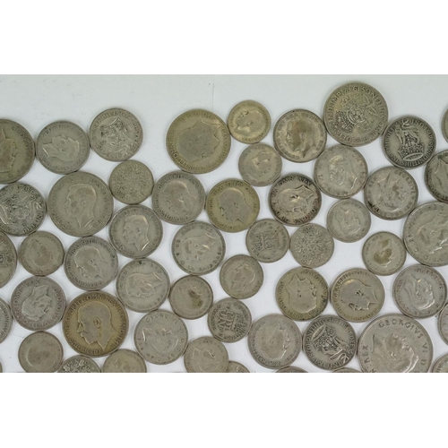 74 - A large collection of British pre decimal silver coins to include half crowns, florins, shillings an... 