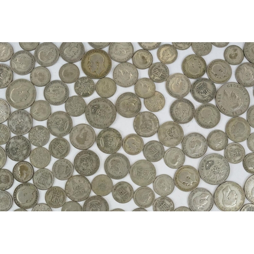 74 - A large collection of British pre decimal silver coins to include half crowns, florins, shillings an... 