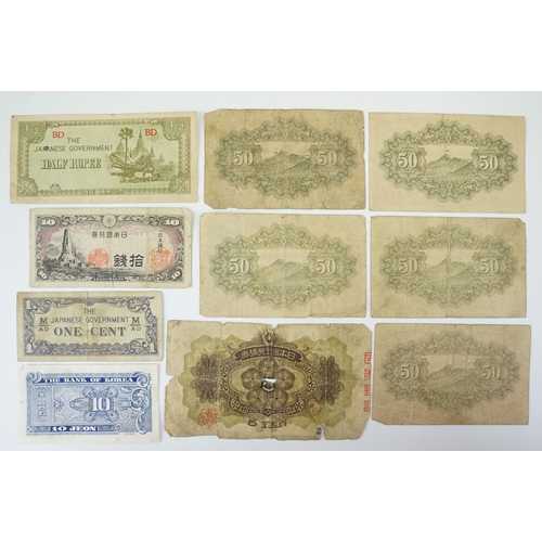 76 - A large collection of mainly Japanese Government Wartime banknotes together with other examples.