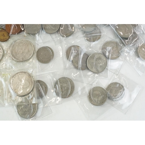 8 - A large collection of World & Commonwealth coins to include a good selection of silver examples.