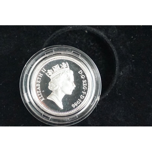 84 - A Royal Mint Queen Elizabeth II 1984-1987 £1 silver proof four coin set, encapsulated within fitted ... 