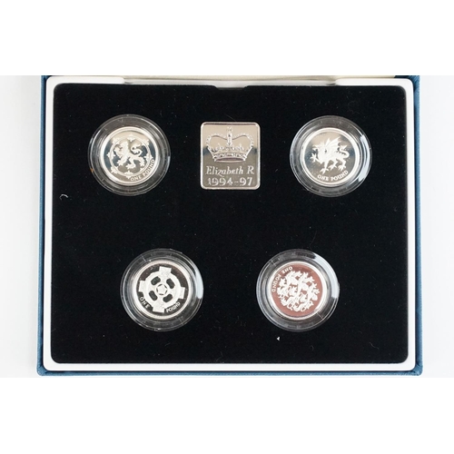 85 - A Royal Mint Queen Elizabeth II 1994-1997 £1 silver proof four coin set, encapsulated within fitted ... 