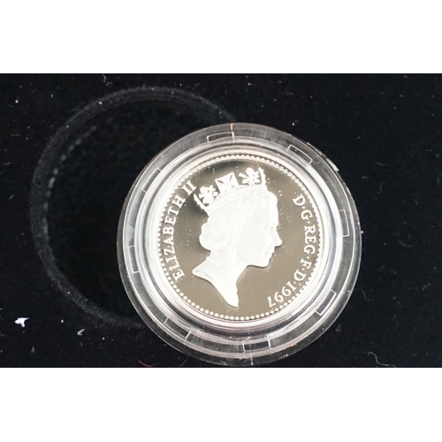 85 - A Royal Mint Queen Elizabeth II 1994-1997 £1 silver proof four coin set, encapsulated within fitted ... 