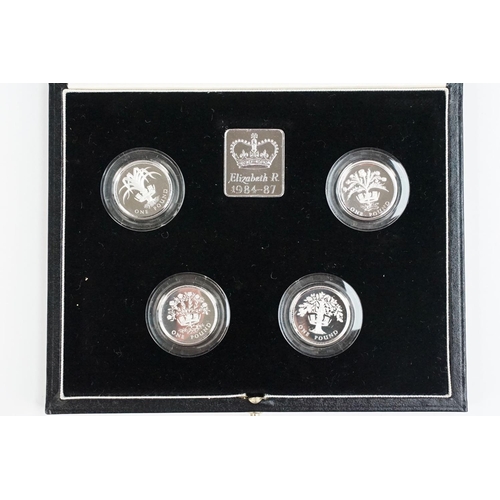 86 - A Royal Mint Queen Elizabeth II 1984-1987 £1 piedfort silver proof four coin set, encapsulated withi... 