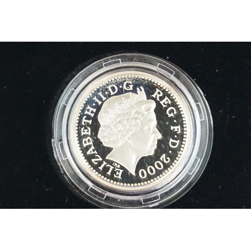 89 - A collection of four Royal Mint Queen Elizabeth II £1 silver proof coins to include 2002, 2000, 2003... 