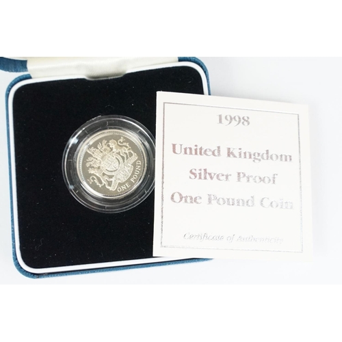 90 - A collection of four Royal Mint Queen Elizabeth II £1 silver proof coins to include 1993, 1998, 1989... 