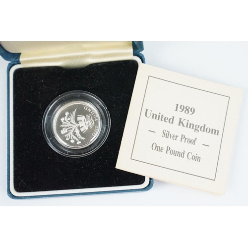 90 - A collection of four Royal Mint Queen Elizabeth II £1 silver proof coins to include 1993, 1998, 1989... 