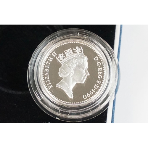 90 - A collection of four Royal Mint Queen Elizabeth II £1 silver proof coins to include 1993, 1998, 1989... 