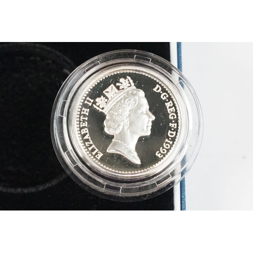 90 - A collection of four Royal Mint Queen Elizabeth II £1 silver proof coins to include 1993, 1998, 1989... 