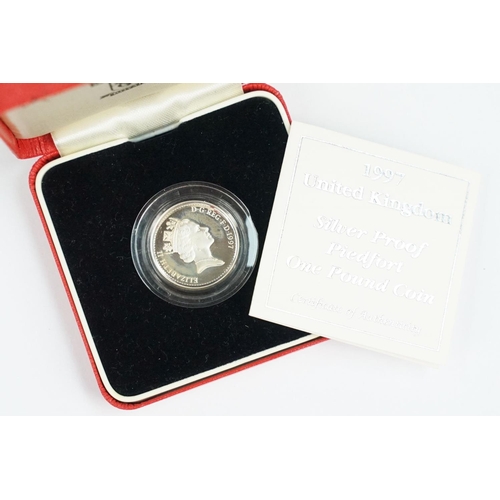 91 - A collection of four Royal Mint Queen Elizabeth II £1 silver proof coins to include 2001, 1996, 1994... 