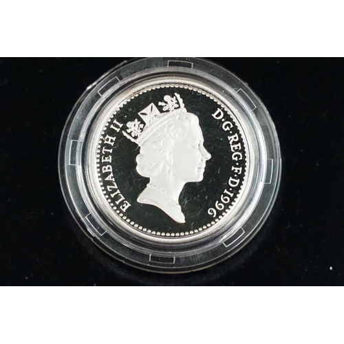 91 - A collection of four Royal Mint Queen Elizabeth II £1 silver proof coins to include 2001, 1996, 1994... 