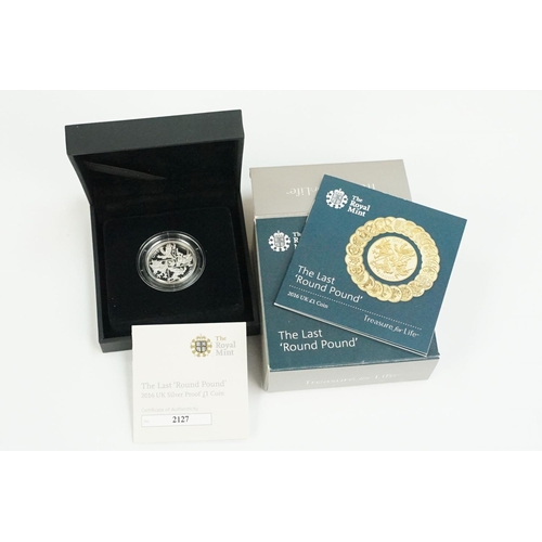 93 - A collection of three Royal Mint Queen Elizabeth II £1 silver proof coins to include 2016, 2015, and... 