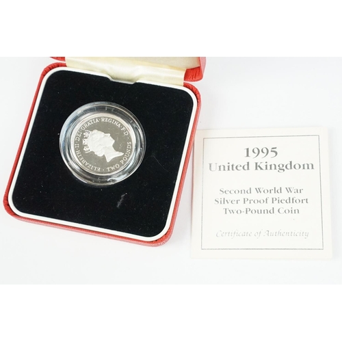 94 - A collection of four Royal Mint Queen Elizabeth II £2 silver proof coins to include 1994, 1986, 1995... 