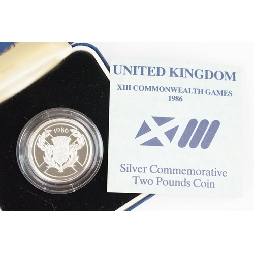 94 - A collection of four Royal Mint Queen Elizabeth II £2 silver proof coins to include 1994, 1986, 1995... 