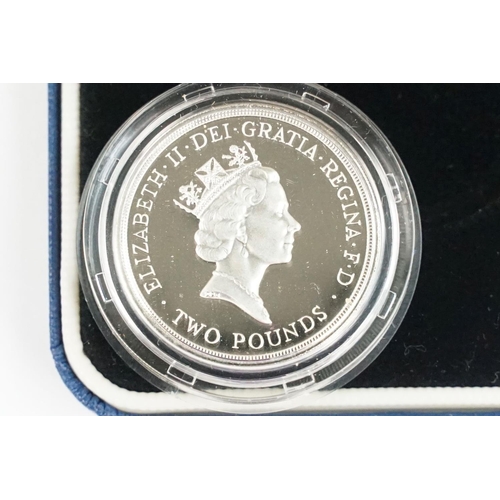 94 - A collection of four Royal Mint Queen Elizabeth II £2 silver proof coins to include 1994, 1986, 1995... 