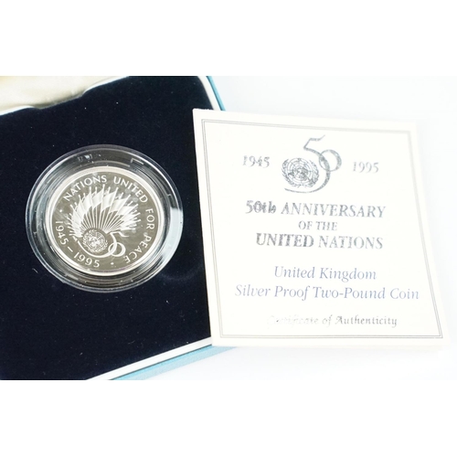 94 - A collection of four Royal Mint Queen Elizabeth II £2 silver proof coins to include 1994, 1986, 1995... 