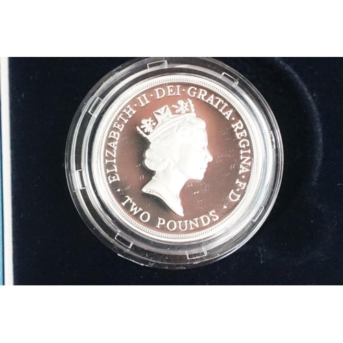 94 - A collection of four Royal Mint Queen Elizabeth II £2 silver proof coins to include 1994, 1986, 1995... 