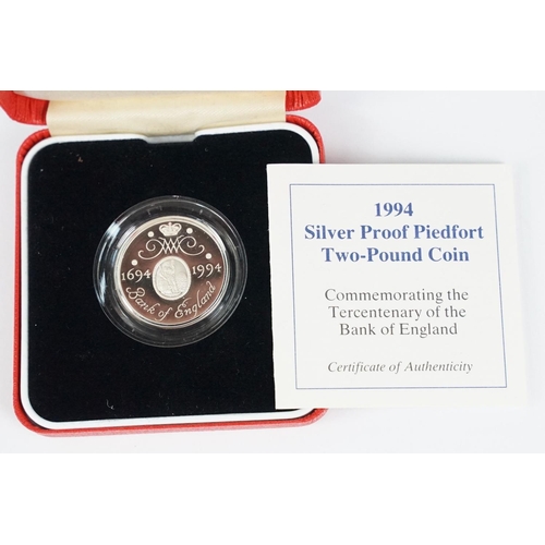 95 - A collection of four Royal Mint Queen Elizabeth II £2 silver proof coins to include 1994, 1996, 1999... 