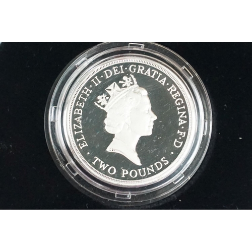 95 - A collection of four Royal Mint Queen Elizabeth II £2 silver proof coins to include 1994, 1996, 1999... 