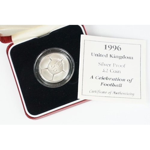 96 - A collection of four Royal Mint Queen Elizabeth II £2 silver proof coins to include 1996, 1999, 2006... 