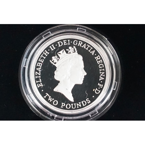 97 - A collection of four Royal Mint Queen Elizabeth II £2 silver proof coins to include 2001, 1996, 1986... 