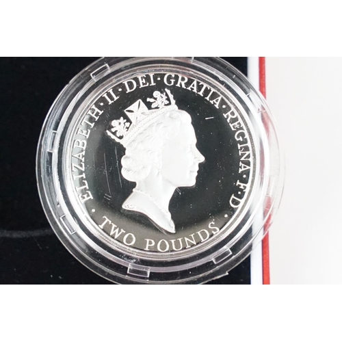 97 - A collection of four Royal Mint Queen Elizabeth II £2 silver proof coins to include 2001, 1996, 1986... 