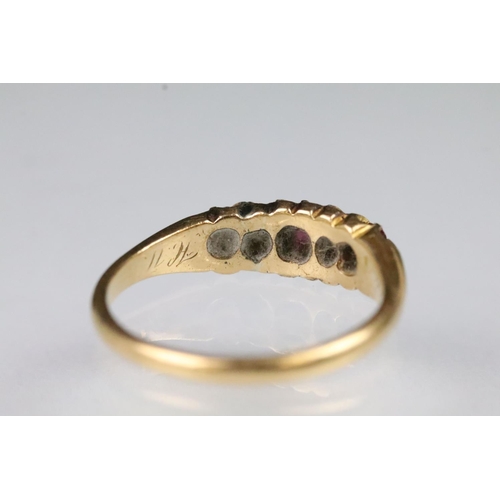 35 - 19th Century Victorian 18ct gold ruby and diamond ring. The ring being set with three round cut rubi... 