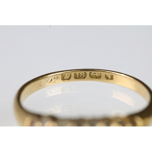 35 - 19th Century Victorian 18ct gold ruby and diamond ring. The ring being set with three round cut rubi... 